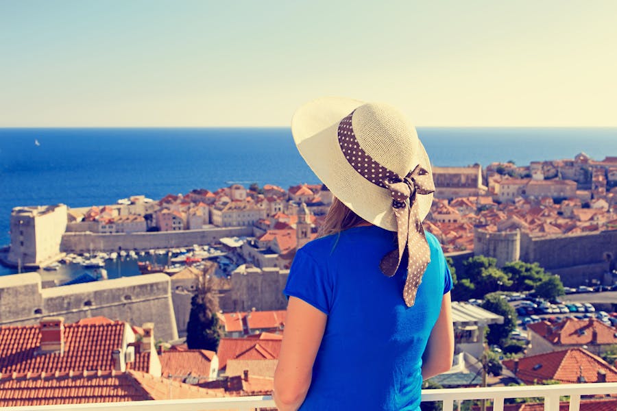 young woman looking at dubrovnik old town.jpg